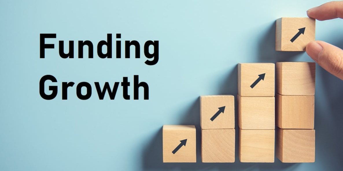 Business concept growth success process, Close up Woman hand arranging wood block stacking as step stair on paper blue background, copy space.